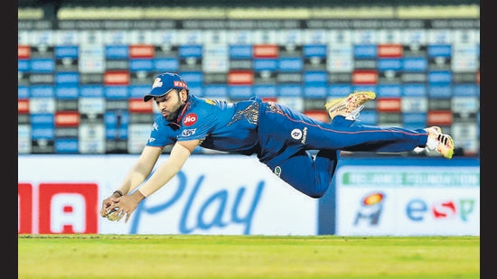 Mumbai Indians captain Rohit Sharma dives for the ball during a match against Royal Challengers Bangalore last week. (PTI) Mumbai Indians captain Rohit Sharma dives for the ball during a match against Royal Challengers Bangalore last week. (PTI)