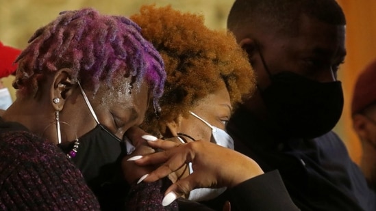 Angie Golson, grandmother of Daunte Wright, and Naisha Wright, aunt of Wright, hold each other as they stand with other family members during a news conference with Attorney Ben Crump to respond to the charges against former Brooklyn Center police officer Kim Potter, who shot and killed Wright days ago, in Minneapolis, Minnesota.(REUTERS)