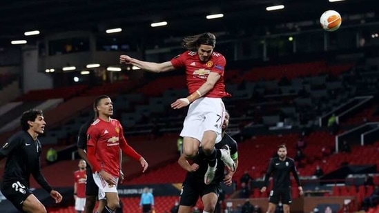 Manchester United v Granada - Old Trafford, Manchester, Britain - April 15, 2021 Manchester United's Edinson Cavani heads at goal(REUTERS)