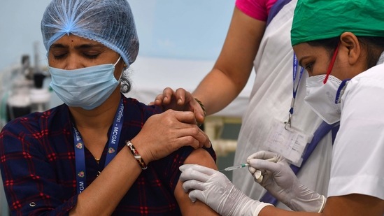 A medical worker inoculates a colleague with a Covid-19 coronavirus vaccine, Mumbai, January 16, 2021 (AFP) A medical worker inoculates a colleague with a Covid-19 coronavirus vaccine, Mumbai, January 16, 2021 (AFP)