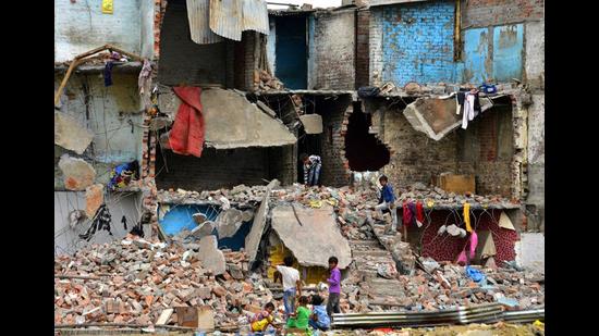 Structures, along the Buddha Nullah, that were demolished by the municipal corporation at Upkar Nagar in Ludhiana on Friday. (Gurpreet Singh/HT) Structures, along the Buddha Nullah, that were demolished by the municipal corporation at Upkar Nagar in Ludhiana on Friday. (Gurpreet Singh/HT)