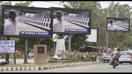 Hoardings featuring Punjab cabinet minister Bharat Bhushan Ashu installed near the BRS Nagar Sidhwan Canal Bridge in Ludhiana. (Gurpreet Singh/HT) Hoardings featuring Punjab cabinet minister Bharat Bhushan Ashu installed near the BRS Nagar Sidhwan Canal Bridge in Ludhiana. (Gurpreet Singh/HT)