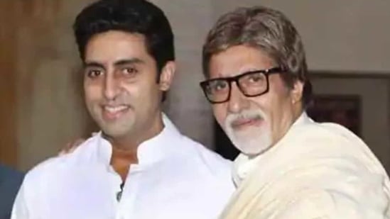 Abhishek Bachchan poses with his father, Amitabh Bachchan.