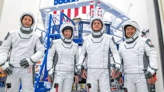 This undated photo made available by SpaceX in April 2021 shows the crew for its third astronaut launch to the International Space Station, during a training session at the SpaceX training facility in Hawthorne, Calif. From the left are mission specialist Thomas Pesquet of the European Space Agency, pilot Megan McArthur and commander Shane Kimbrough of Nasa, and mission specialist Akihiko Hoshide of the Japan Aerospace Exploration Agency. (SpaceX via AP) This undated photo made available by SpaceX in April 2021 shows the crew for its third astronaut launch to the International Space Station, during a training session at the SpaceX training facility in Hawthorne, Calif. From the left are mission specialist Thomas Pesquet of the European Space Agency, pilot Megan McArthur and commander Shane Kimbrough of Nasa, and mission specialist Akihiko Hoshide of the Japan Aerospace Exploration Agency. (SpaceX via AP)