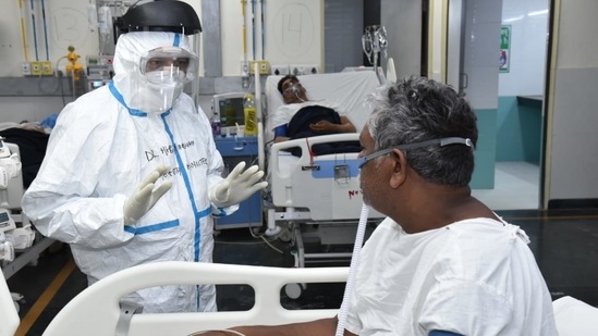 Union health minister Harsh Vardhan meeting Covid-19 patients at AIIMS on Friday. (@drharshvardhan/Twitter ) Union health minister Harsh Vardhan meeting Covid-19 patients at AIIMS on Friday. (@drharshvardhan/Twitter )