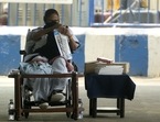 West Bengal Chief Minister and Trinamool Congress supremo Mamata Banerjee paints during a sit-in dharna to protest against Election Commission's decision to impose a 24 hours ban on her election campaigning, in front of Gandhi statue at Mayo Road, in Kolkata. (Samir Jana/Hindustan Times)