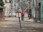 Jaipur: Bamboo poles placed as barricading to keep people inside an area declared a Covid-19 containment zone at Malviya Nagar, in Jaipur, Rajasthan, India on Wednesday, April 14, 2021. 