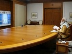 PM Modi in a Covid-19 review meeting with top officials on Saturday.(ANI Photo ) PM Modi in a Covid-19 review meeting with top officials on Saturday.(ANI Photo )