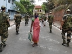 Security personnel conduct patrolling ahead of the 5th phase of West Bengal Assembly elections at Bidhannagar in Kolkata.(PTI)