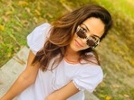 Mira Rajput is seen enjoying time on a lawn.