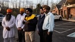 Leaders of the Sikh Satsang of Indianapolis participate in an interview addressing their grief in the parking lot of their temple.(AFP) Leaders of the Sikh Satsang of Indianapolis participate in an interview addressing their grief in the parking lot of their temple.(AFP)
