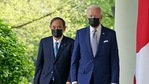 US President Joe Biden and Japan's Prime Minister Yoshihide Suga walk through the Colonnade to take part in a joint press conference in the Rose Garden of the White House in Washington. (AFP) US President Joe Biden and Japan's Prime Minister Yoshihide Suga walk through the Colonnade to take part in a joint press conference in the Rose Garden of the White House in Washington. (AFP)