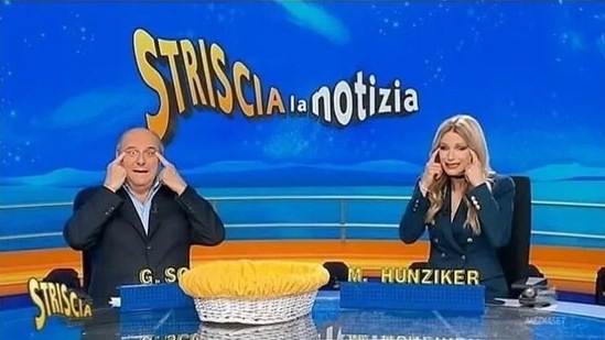 Michelle Hunziker and Gerry Scotti, hosts of the satirical show “Striscia la Notizia” (“The News Crawls”) on the private Mediaset network, apologized for the sketch during which they made slanted-eye gestures and mimicked a Chinese accent as they introduced a segment.(Screengrab)
