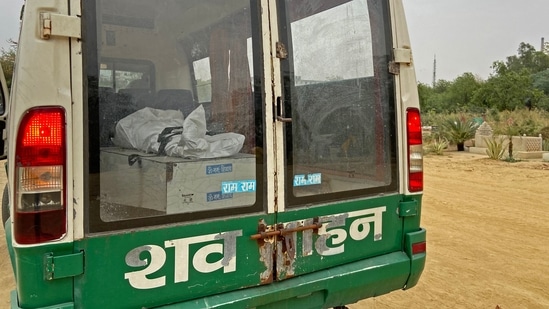 A dead body of a Covid-19 victim lies inside an ambulance for burial at a graveyard in New Delhi on April 16. The most deaths before this were reported on November 18 last year, when 131 died of the infection. The city has reported 597 fatalities from the infection in the last seven days, compared to 174 deaths in all of February and March.(Aishwarya Kumar / AFP)