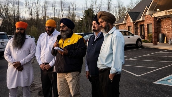 Leaders of the Sikh Satsang of Indianapolis participate in an interview addressing their grief in the parking lot of their temple. (AFP) Leaders of the Sikh Satsang of Indianapolis participate in an interview addressing their grief in the parking lot of their temple. (AFP)