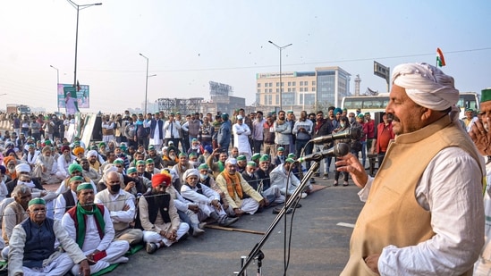 Bharatiya Kisan Union (BKU) President Naresh Tikait addresses farmers during their protest against the new farm laws. (PTI file photo) Bharatiya Kisan Union (BKU) President Naresh Tikait addresses farmers during their protest against the new farm laws. (PTI file photo)
