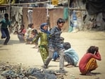 Children playing kho kho in a slum at Punjabi Bagh in New Delhi on Friday.(Sanchit Khanna/HT Photo)