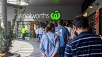 Shoppers line up outside a Woolworths store in Brisbane, Australia. (REUTERS ) Shoppers line up outside a Woolworths store in Brisbane, Australia. (REUTERS )