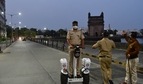 A police personnel patrolling on a segway near Gateway of India before a statewide lockdown to check the spread of Covid-19, at Colaba, in Mumbai. (Bhushan Koyande/ HT Photo) A police personnel patrolling on a segway near Gateway of India before a statewide lockdown to check the spread of Covid-19, at Colaba, in Mumbai. (Bhushan Koyande/ HT Photo)