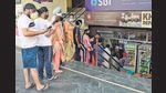 Residents queuing up outside a departmental store to stock up on essentials, after the district administration announced a complete lockdown in Dugri’s Phases 1 and 2 in Ludhiana on Sunday afternoon. (Harsimar Pal Singh/HT) Residents queuing up outside a departmental store to stock up on essentials, after the district administration announced a complete lockdown in Dugri’s Phases 1 and 2 in Ludhiana on Sunday afternoon. (Harsimar Pal Singh/HT)