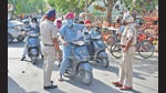 Police stopping movement of commuters in Dugri’s Urban Estate, Phase 1, after the administration imposed a complete lockdown in the area on Sunday afternoon. (Harsimar Pal Singh/HT) Police stopping movement of commuters in Dugri’s Urban Estate, Phase 1, after the administration imposed a complete lockdown in the area on Sunday afternoon. (Harsimar Pal Singh/HT)