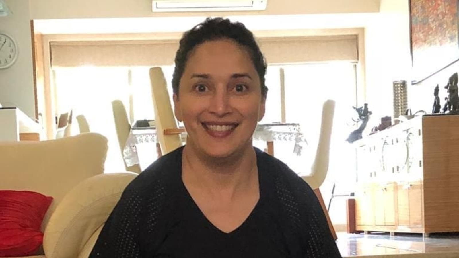 Madhuri Dixit shows fans a funny expression while performing yoga: 'Embracing my goofy side' - Hindustan Times