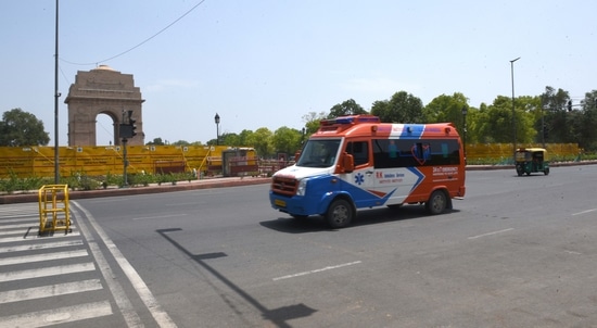 An ambulance seen near India Gate during a weekend curfew to check the spread of Covid-19, in New Delhi. ( Arvind Yadav/ Hindustan Times) An ambulance seen near India Gate during a weekend curfew to check the spread of Covid-19, in New Delhi. ( Arvind Yadav/ Hindustan Times)