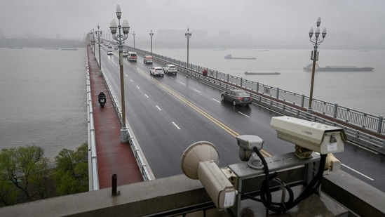 An aerial view of the Ninjiang Bridge over the Yangtze river in Jiangsu province, on April 1. When it was completed in 1968, the double-decker bridge was celebrated as a feat of Chinese engineering. It won a place in the Guinness Book of World Records as the longest dual highway and railway bridge. More recently, it is believed to be the location of the most suicides in the world, having overtaken the Golden Gate Bridge in San Francisco some years ago.(Wang Zhao / AFP)