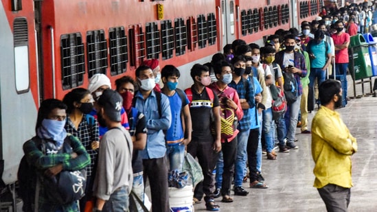 Migrants from Maharashtra queue up at the Patna railway station for Covid-19 testing on Sunday. (PTI) Migrants from Maharashtra queue up at the Patna railway station for Covid-19 testing on Sunday. (PTI)