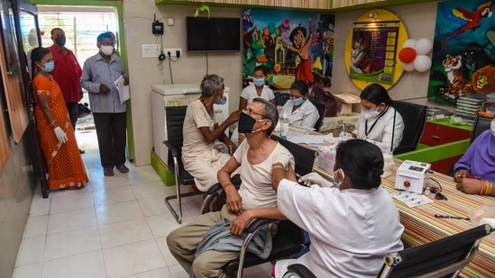 Patna: Beneficiaries receiving the second dose of COVID-19 vaccine at a government dispensary, amid rise in Covid-19 cases across the country, in Patna, Sunday, April 18, 2021. (PTI Photo)(PTI04_18_2021_000013B)(PTI)