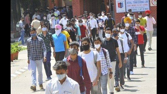 Students leaving an examination centre in Chandigarh on Sunday. (Keshav Singh/HT) Students leaving an examination centre in Chandigarh on Sunday. (Keshav Singh/HT)