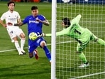 Real Madrid's Thibaut Courtois makes a save