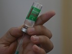 A medical staff fills a syringe with the Covishield, AstraZeneca-Oxford's Covid-19 coronavirus vaccine at a vaccination centre amidst rising Covid-19 coronavirus cases, in Mumbai. (AFP) A medical staff fills a syringe with the Covishield, AstraZeneca-Oxford's Covid-19 coronavirus vaccine at a vaccination centre amidst rising Covid-19 coronavirus cases, in Mumbai. (AFP)