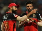 RCB skipper Virat Kohli with pacer Mohammed Siraj