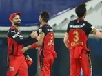 RCB celebrate win over KKR (L); Shikhar Dhawan celebrates his fifty (R)