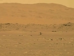 In this image from Nasa, Nasa's experimental Mars helicopter Ingenuity lands on the surface of Mars.(AP)
