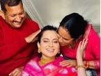Kangana Ranaut poses with her parents (R). Kangana Ranaut poses with her parents (R).