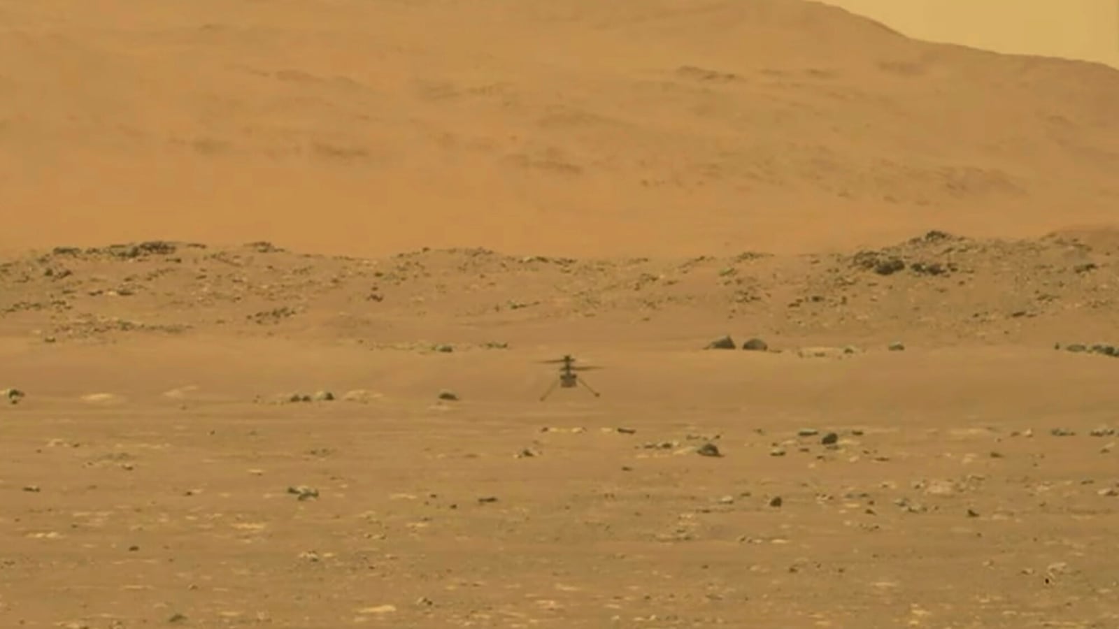 In a first, Nasa's Ingenuity helicopter makes history with flight on Mars