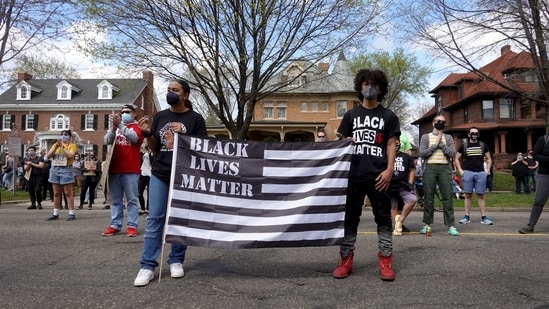 Demonstrators gather outside the governor's mansion for a rally and march against police brutality . (AFP) Demonstrators gather outside the governor's mansion for a rally and march against police brutality . (AFP)