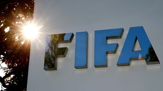 FILE PHOTO: The logo of FIFA is seen in front of its headquarters in Zurich(REUTERS)