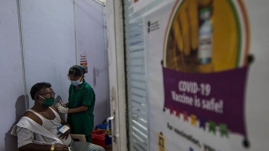An elderly man gets vaccinated against Covid-19, at BKC, in Mumbai. (Pratik Chorge/Hindustan Times)