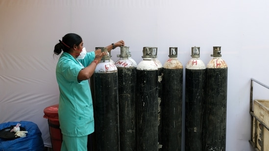 Prompt arrangement of oxygen cylinders by police helped save at least 35 Covid-19 patients, said senior officials. (Bloomberg representative image) Prompt arrangement of oxygen cylinders by police helped save at least 35 Covid-19 patients, said senior officials. (Bloomberg representative image)