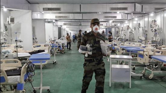 Security personnel at DRDO's Covid care centre, at Delhi Cantt in New Delhi on Sunday, April 18. (ANI) Security personnel at DRDO's Covid care centre, at Delhi Cantt in New Delhi on Sunday, April 18. (ANI)