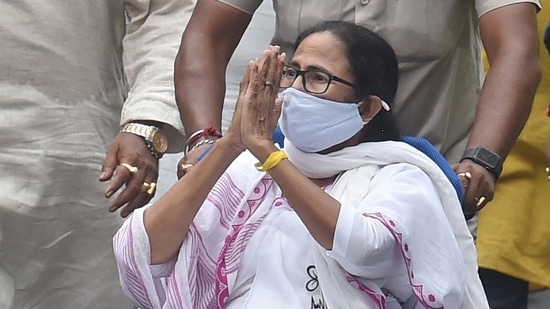 Kolkata: TMC party supremo and West Bengal Chief Minister Mamata Banerjee during a roadshow in support of her party candidates for the ongoing state assembly polls in Kolkata on Sunday, April 18, 2021. (PTI)