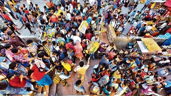 A huge rush of migrant workers at Kaushambi bus stand, hours before the week-long lockdown in the Capital kicked in. ( Raj K Raj /HT ) A huge rush of migrant workers at Kaushambi bus stand, hours before the week-long lockdown in the Capital kicked in. ( Raj K Raj /HT )