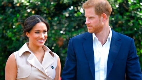 Britain's Prince Harry and Meghan Markle appear at the Creative Industries and Business Reception at the British High Commissioner's residence in Johannesburg. (AP)