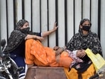 Grieving relatives and family members of a person who died of Covid-19, break down outside the LNJP Hospital mortuary while waiting to collect the body, in New Delhi on April 19. As of April 20, there are a total of 2,031,977 active cases across the country, the highest active caseload ever recorded in India since the start of the outbreak in March last year, according to the health ministry’s update.(Ajay Aggarwal / HT Photo)