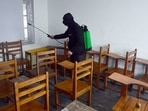 A worker sanitizes the classrooms ahead of the opening of schools after the COVID-19 outbreak, in Srinagar on Saturday. (ANI Photo) A worker sanitizes the classrooms ahead of the opening of schools after the COVID-19 outbreak, in Srinagar on Saturday. (ANI Photo)