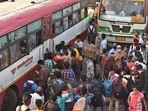 A huge rush of migrant workers at Anand Vihar Bus Terminus hours before the week-long lockdown, in Ghaziabad, India, on Monday, April 19, 2021. 