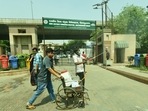 Health workers sanitize the premises of a district hospital at sector 30, in Noida, India, on Monday, April 19, 2021. Health workers sanitize the premises of a district hospital at sector 30, in Noida, India, on Monday, April 19, 2021.